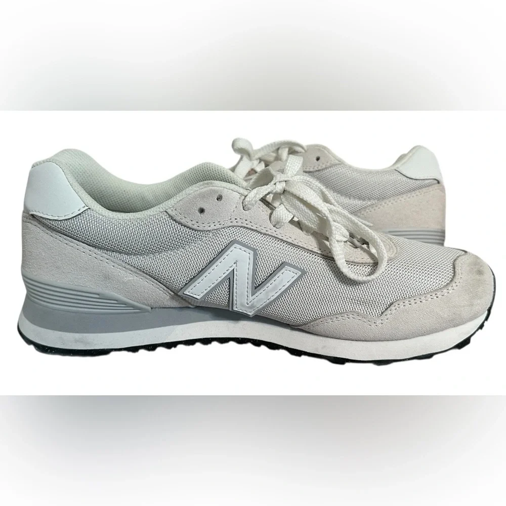 New Balance Grey / White athletic sneakers.